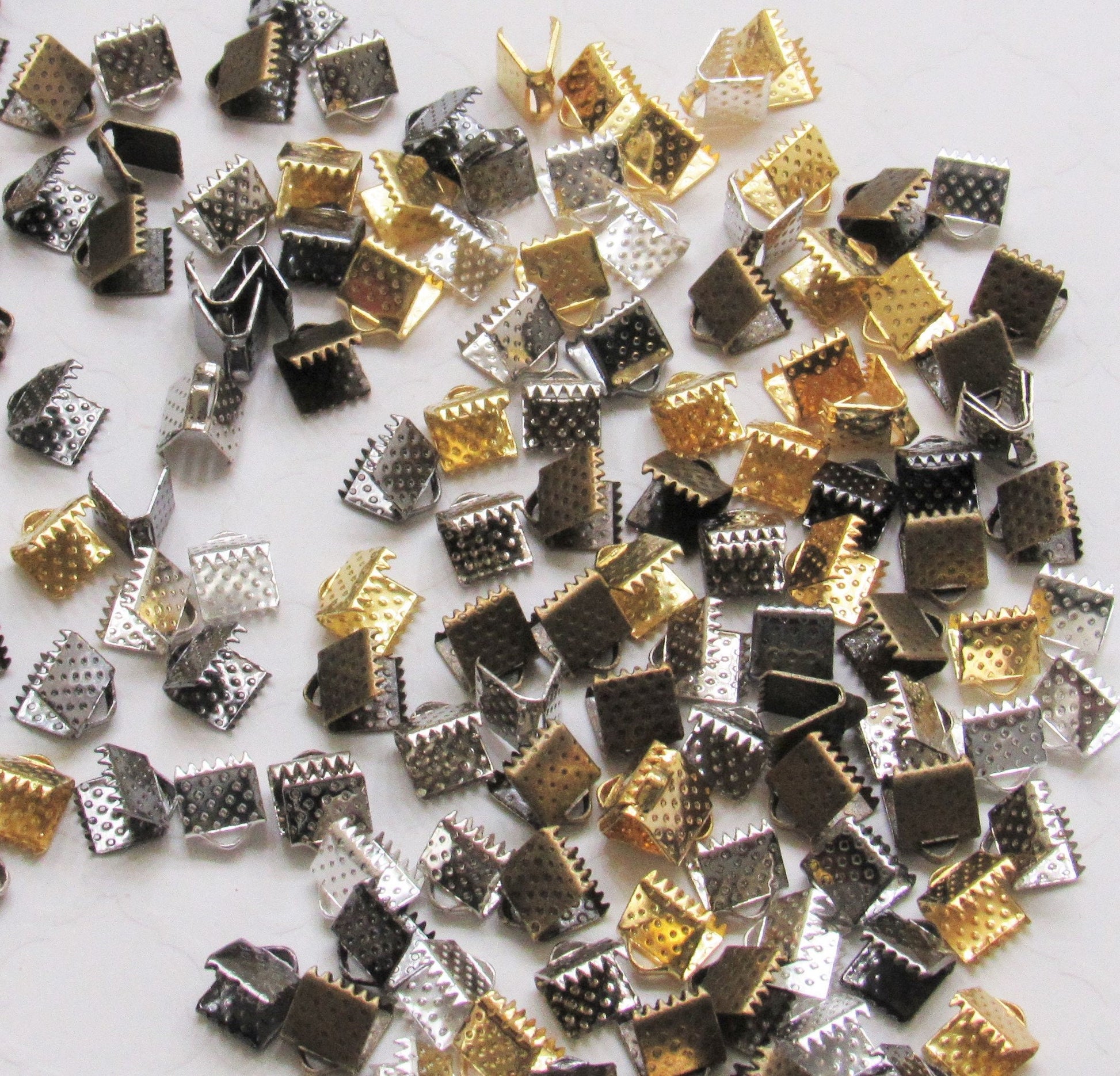 10 Ct. Iron Ribbon Ends, Crimp Clasps, Suede Cord Clasps, Ribbon Necklaces, Mixed Color  Size: About 6mm Wide 6mm Long